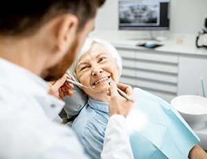 Older woman smiling in the treatment chair