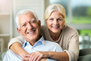Older couple with beautiful smiles